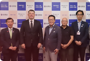 people from poland and japan smiling